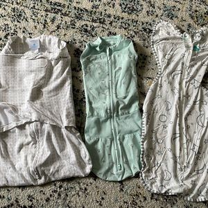 Bundle of swaddles, including Halo and Happiest Baby